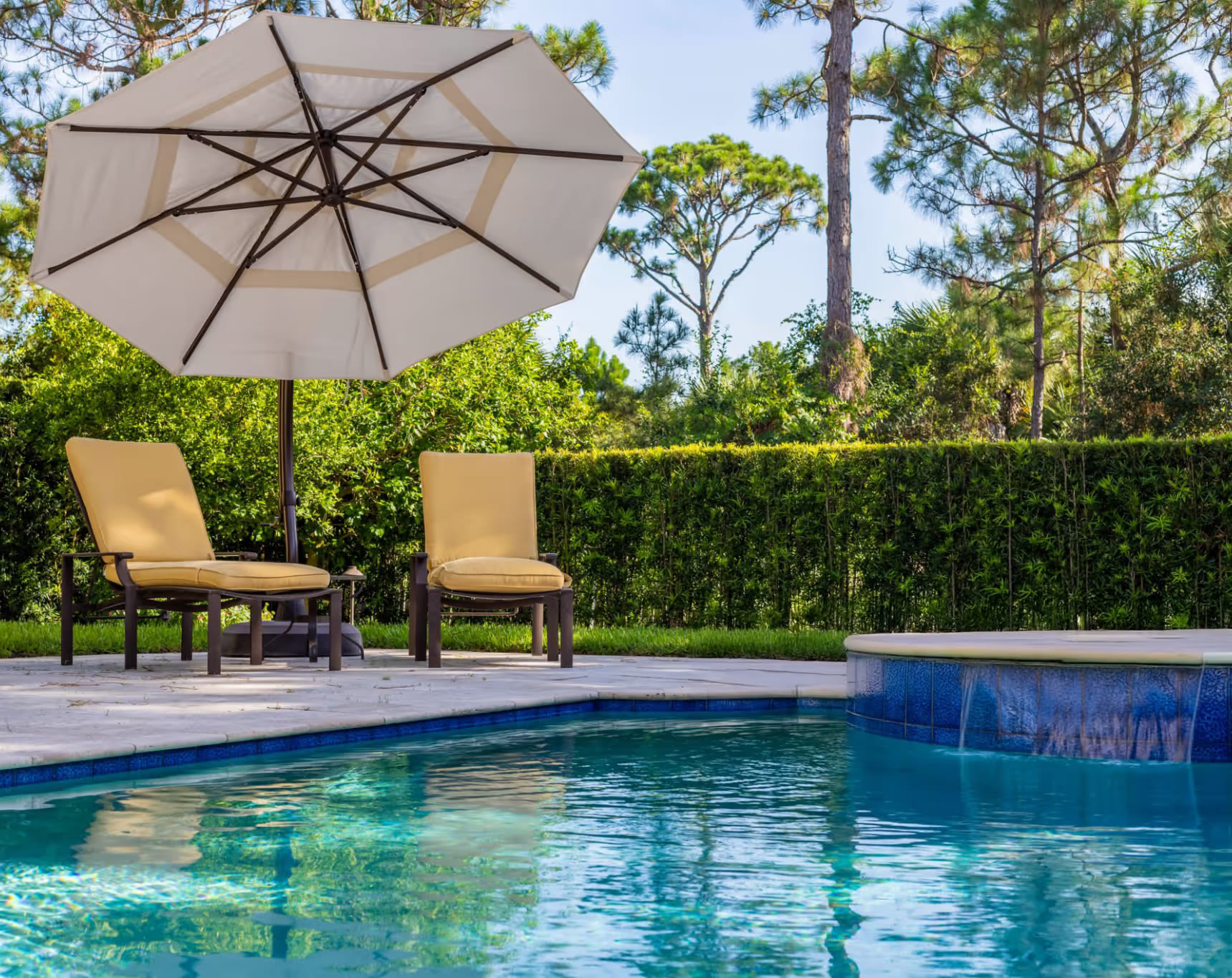 Family enjoying a custom backyard pool